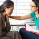 Mental health professional counseling a patient whose stress affects their well-being.