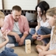 Parents playing a game with their children.