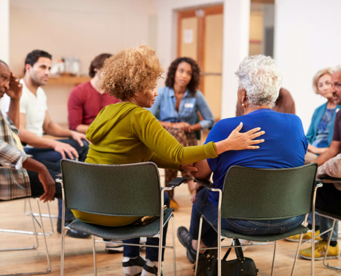 Image of a support group meeting as part of treatment for gambling addiction.